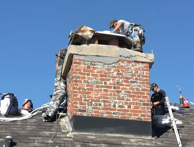Port Wentworth Chimney Sweep installing a custom chimney crown in Port Wentworth, GA