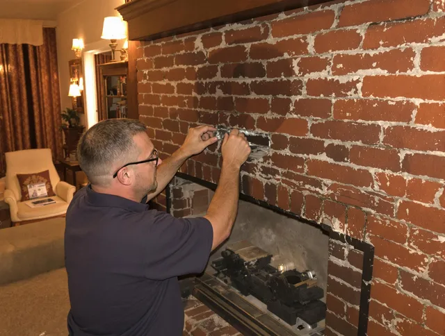 Port Wentworth Chimney Sweep expert fixing a fireplace in Port Wentworth, GA